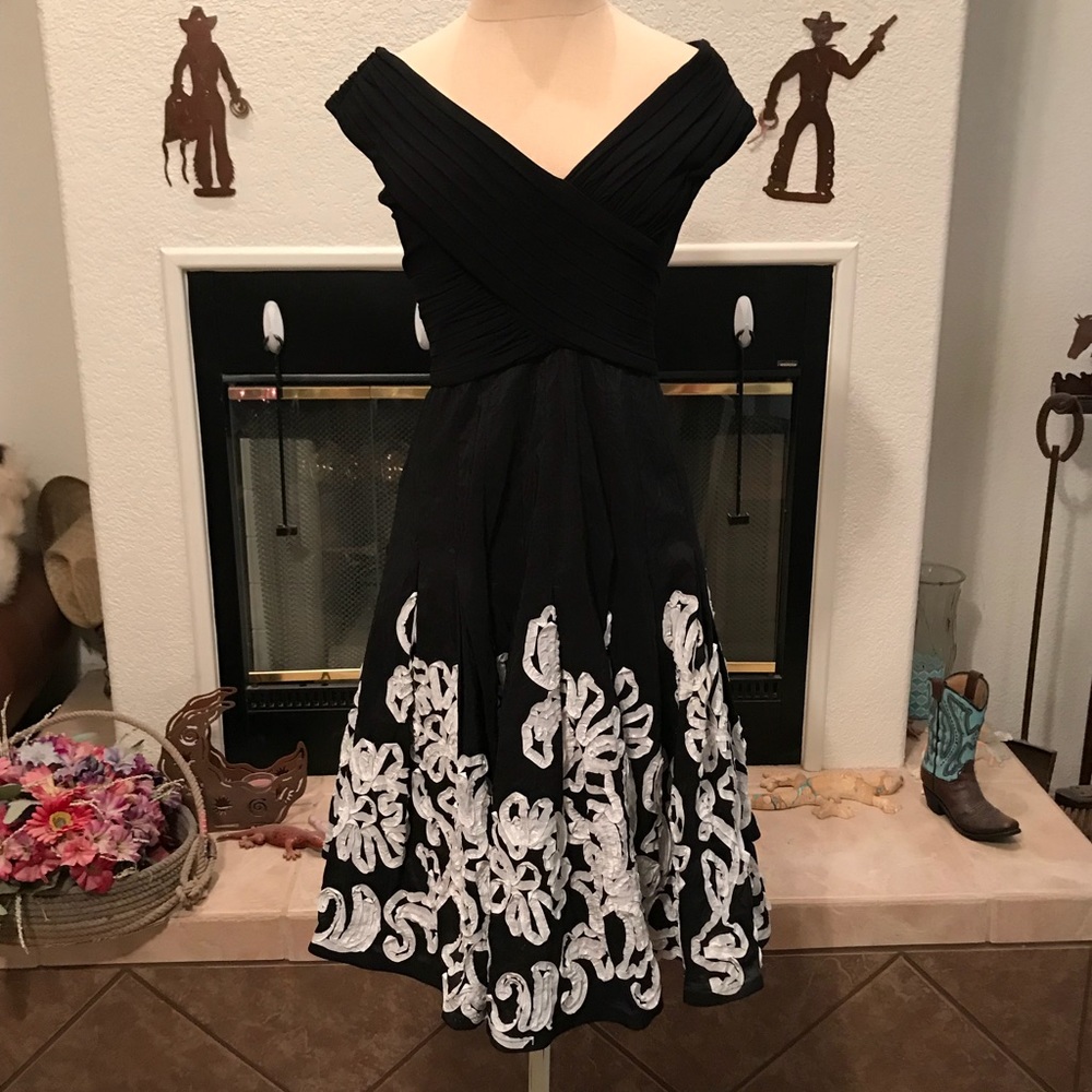 Off the shoulder black with white floral dress.